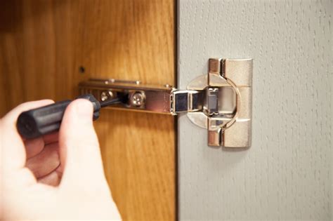 Adjust the door up or down How To Adjust Old Cabinet Door Hinges