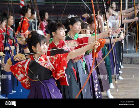 Kyoto Japan Young Female Archers Dressed In Kimono Try To Find The