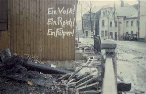 German Graffiti Painted On The Wall Of A Wooden Building On A Bomb