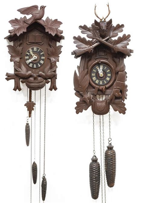 2 German Black Forest Carved Cuckoo Clocks