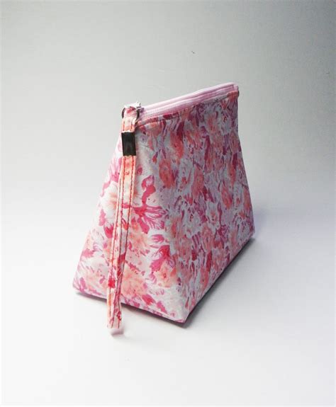 A Cool And Chic Wedge Bag To Store Your Bits And Bobs To