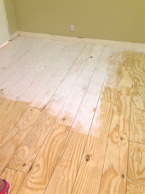 Instead of leaving a painted plywood subfloor plain, jazz up your paint job a bit with a few decorative elements. Remodelaholic | DIY Plywood Flooring Pros and Cons + Tips