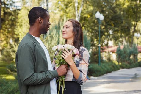 Man Giving Flowers For His Beautiful Girlfriend Stock Image Image Of Couple Concept 108896369