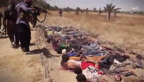 Isis Execution Video Shows Prisoners In Mass Graves Before