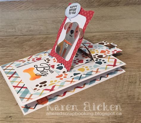 Design your own 'pull tab' card as seen in the image below. Altered Scrapbooking: Doggie Pull Tab Card