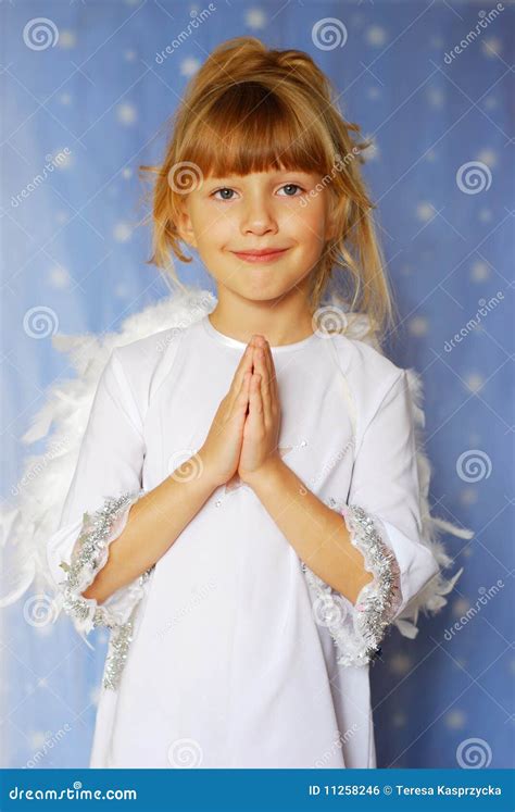 Angel Girl With Hands Folded To The Prayer Stock Photo Image Of Girl