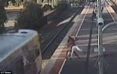Horrifying Footage Shows Teenager Trying To Push Girlfriend In Front Of A Train