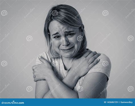 Portrait Of Sad And Intimidated Woman Isolated In White Background