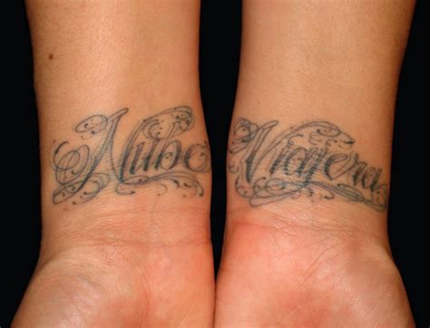 A tattoo that wraps around like a bracelet. 35 Stunning Name Wrist Tattoo Designs