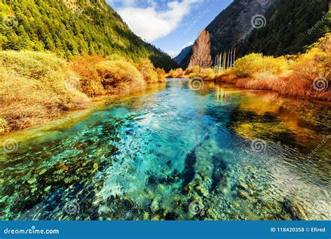 Beautiful Azure Crystal Clear Water Of River In Mountains Stock Photo
