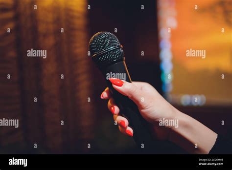 Microphone And Female Singer Close Up Woman Singing Into A Microphone