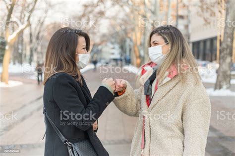 Avoiding Handshakes During Coronavirus Epidemic Stock Photo Download