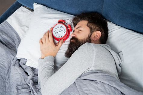 Man Sleeping With Alarm Clock In Bed Sleep Time Stock Photo Image Of