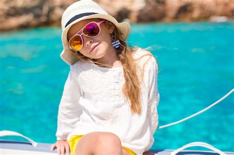 Premium Photo Little Girl Enjoying Sailing On Boat In The Open Sea