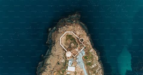 An Aerial View Of An Island In The Middle Of The Ocean Photo Coastal