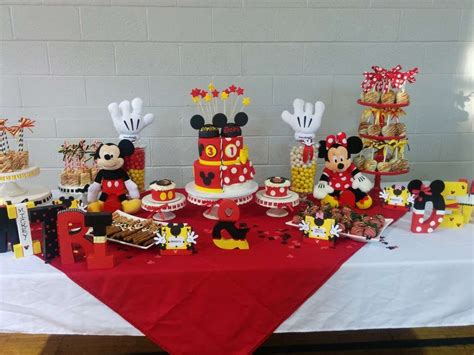 Stuff favor bags with fun party hats and blowouts so they can join in on the magic! Red, black and yellow Mickey & Minnie Mouse birthday party ...