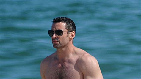 Hugh Jackman Goes Topless To Barcelona Beach