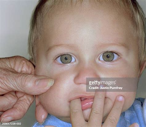 Grandma Pinch Cheek Photos And Premium High Res Pictures Getty Images