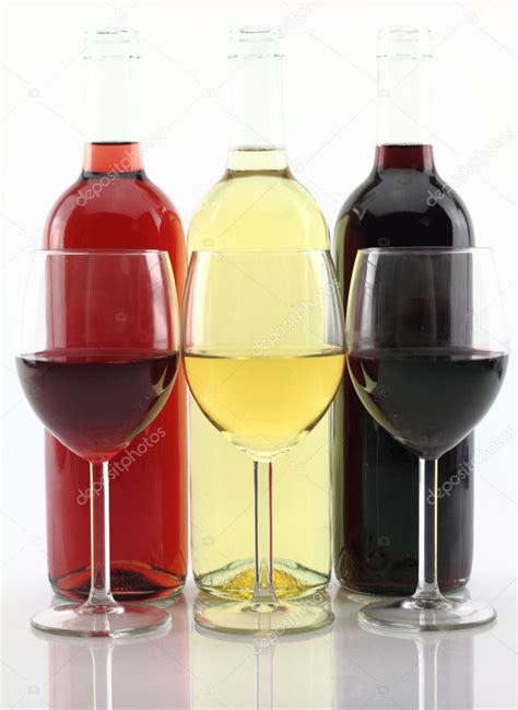 Three Colors Of Wine In Bottles And Glasses — Stock Photo © Viperagp