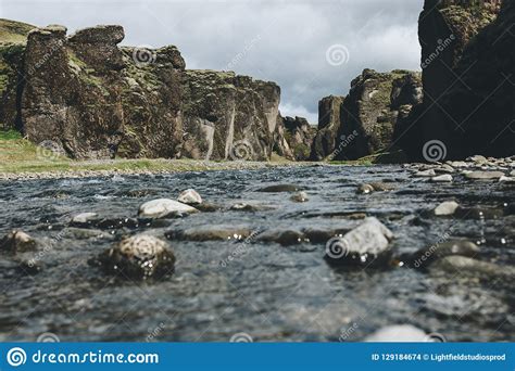 Surface Level Of Beautiful Mountain River Flowing Through Highlands In