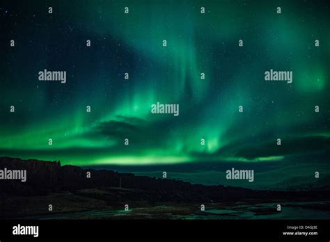 Northern Lights Aurora Borealis Over Iceland Lagoon Stock Photo Alamy