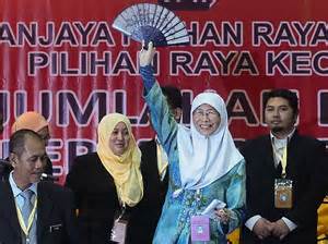 jailed malaysian opposition leader s wife wins his parliament seat the japan times