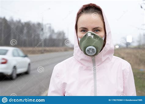 Panning Around Young Woman Wearing Face Mask While Out In The Streets