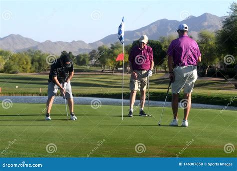 Male Golfers On Putting Green Editorial Image Image Of Leisure Hole
