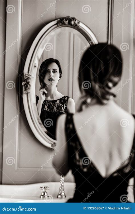 Young Woman Looking In Mirror Stock Image Image Of Skinny Beauty 132968067