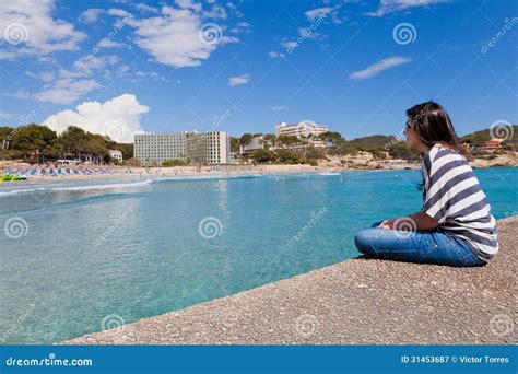 Girl Looking At Paguera Beach Mallorca Royalty Free Stock Photography