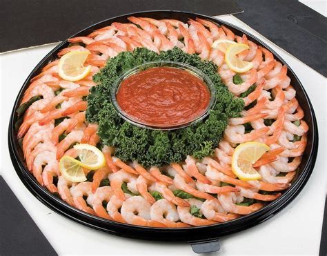 Classic shrimp cocktail is an easy, elegant starter for a special holiday gathering. Party Trays | joesbutchershop.com | Party food appetizers, Party food platters, Food