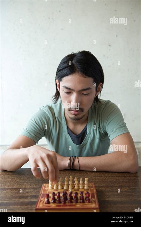 Young Man Playing Chess Stock Photo Alamy
