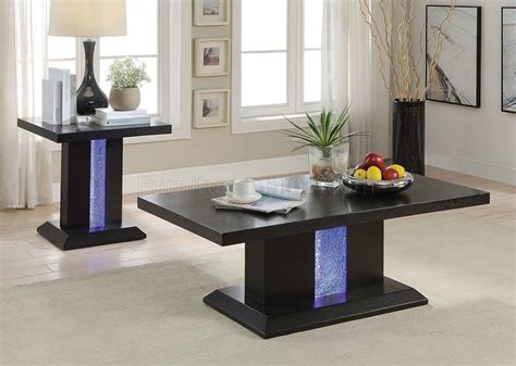 There are many different materials that you can get with your coffee table and each have a specific feel for the atmosphere that you need to set. Bernice 3Pc Coffee & End Tables Set 81650 in Black by Acme