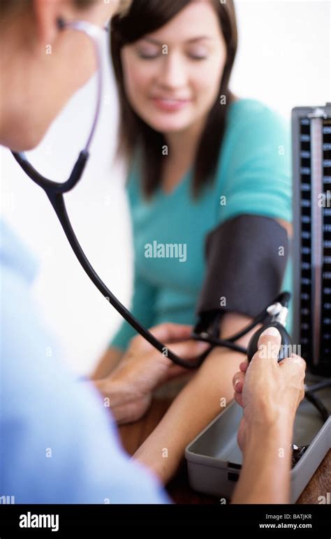 Blood Pressure Measurement General Practice Doctor Using