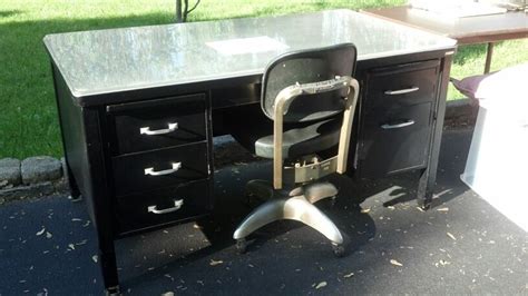 Do you need an amazing teacher desk for your classroom? Black vintage industrial metal desk and chair seen at New ...
