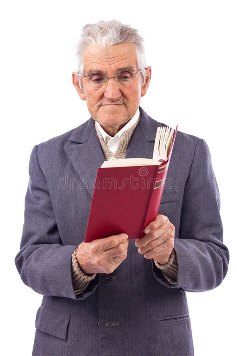Portrait Of An Old Man With Glasses Holding A Red Book Stock Photo