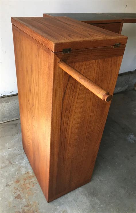 Store a small liquor collection in the cabinet as well as your glassware. Mid Century Folding Cocktail Bar Cabinet by Reno Wahl ...