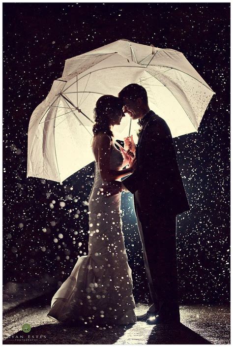 Wedding Photography Where The Couple Is Holding Umbrellas 2050426
