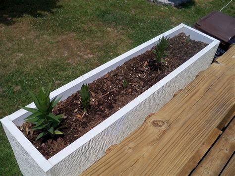 Next, line the bottom of the planter with landscaping cloth; Do It Yourself Vinyl Planter Boxes | Plans