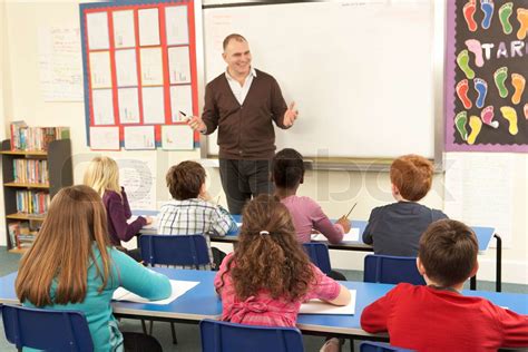 Schüler Die Im Klassenzimmer Mit Lehrer Stock Bild Colourbox