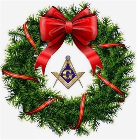A Wreath With A Masonic Symbol On It And Red Ribbon Around The Wreath