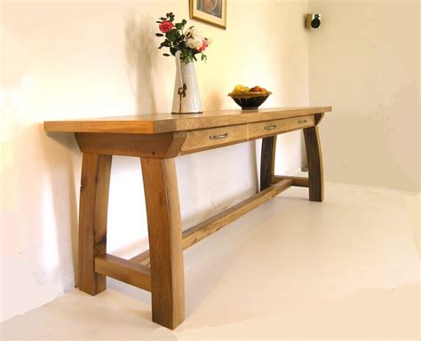 This shelf console is the perfect etagere bookshelf for use as an entryway or accent piece to keep small items within reach and add a touch of elegant decor. Contemporary Oak Console Tables | Bespoke hallway table