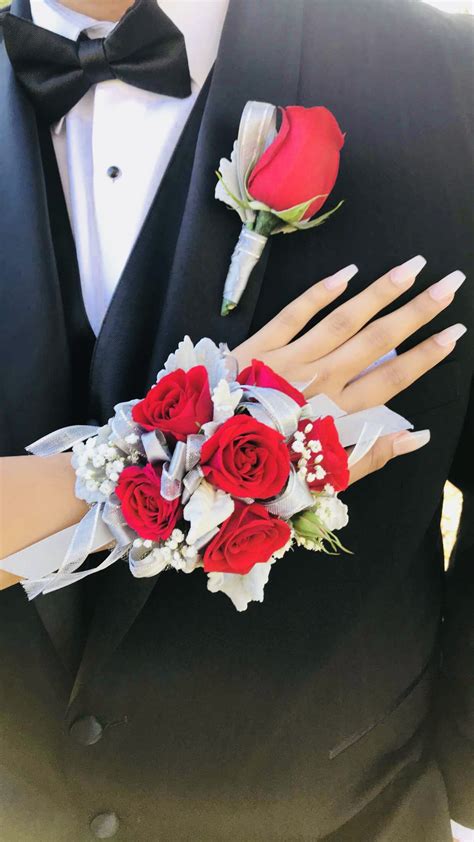 Prom Wristband Corsage And Matching Boutonniere Featuring Red Roses