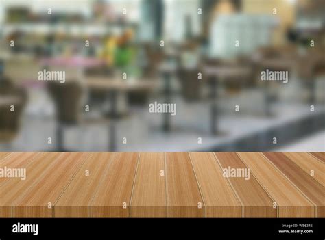 Wooden Tables With Blurred Backgrounds Can Be Used To Display Or Edit