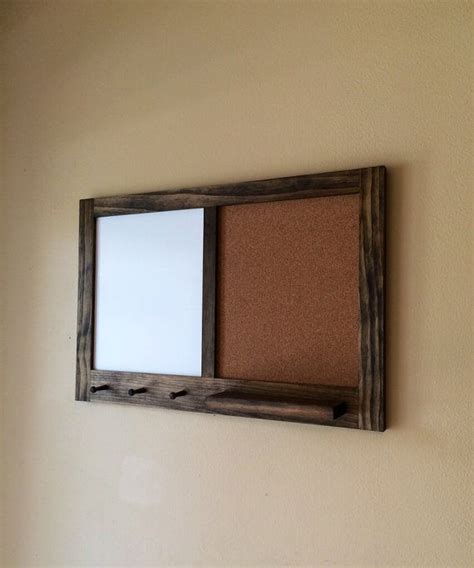 Attach a dry erase pen to the board using string. Framed Hanging Corkboard and Whiteboard with Key Holder ...