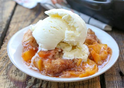 The best peach cobbler recipe is made with canned peaches and easy pantry ingredients that you can how to make an easy peach cobbler recipe with canned peaches and homemade pie crust crumbled on top. Southern Peach Cobbler | Barefeet in the Kitchen