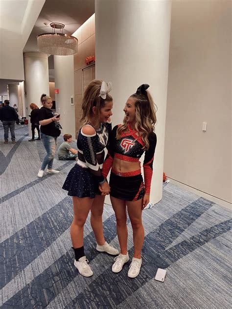 Two Girls Holding Hands Laughing At A Cheer Compititon Together Cheer Cheerposes Tips Girls