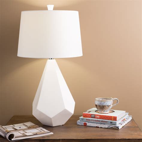 The shade is open at the top. Parlaq Ceramic Base and Bell Faux Silk Shade Table Lamp, White | Zuri Furniture