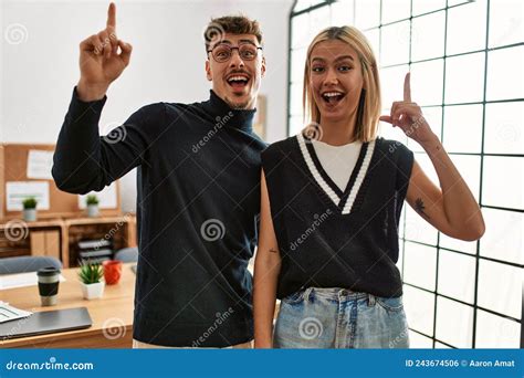 Two Beautiful Business Workers Wearing Business Style Standing At The