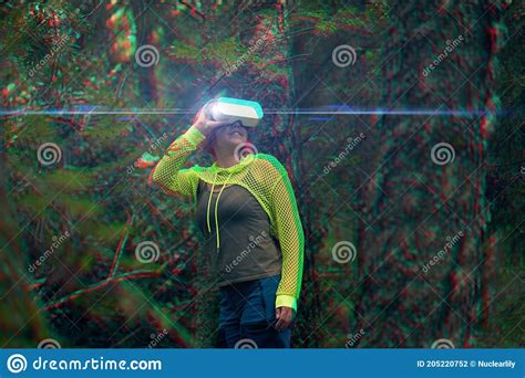 Woman Goes Into Virtual Reality Using Virtual Reality Headset Image